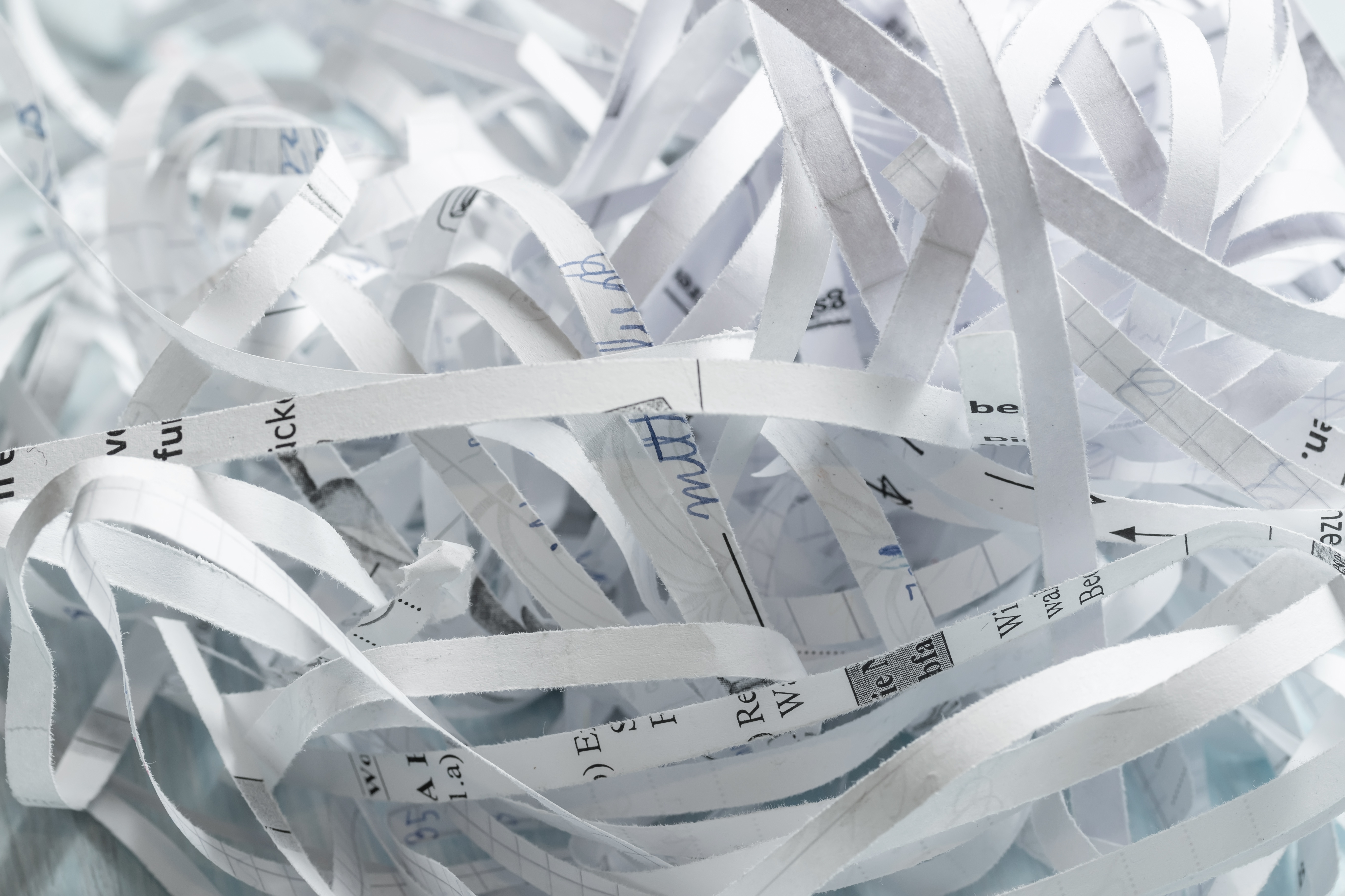 Close-up of shredded confidential documents
